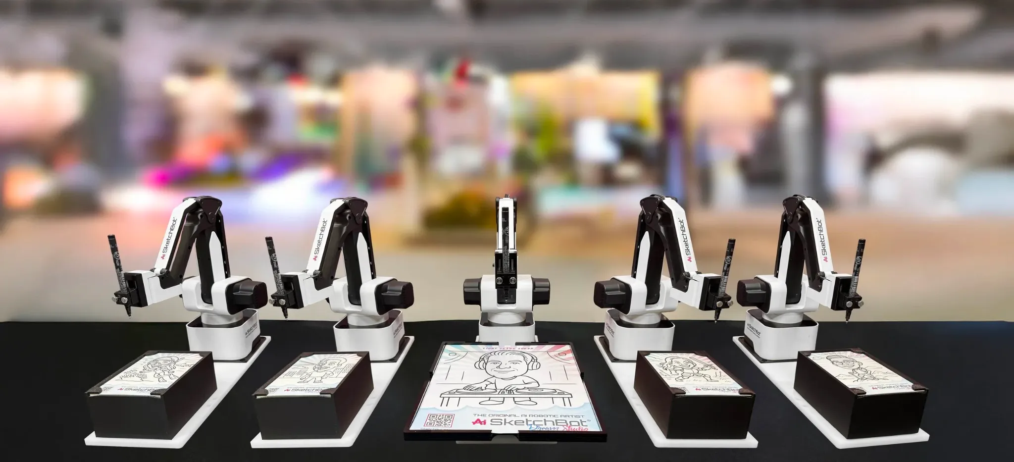 Sketchbots robotic arms creating custom portraits